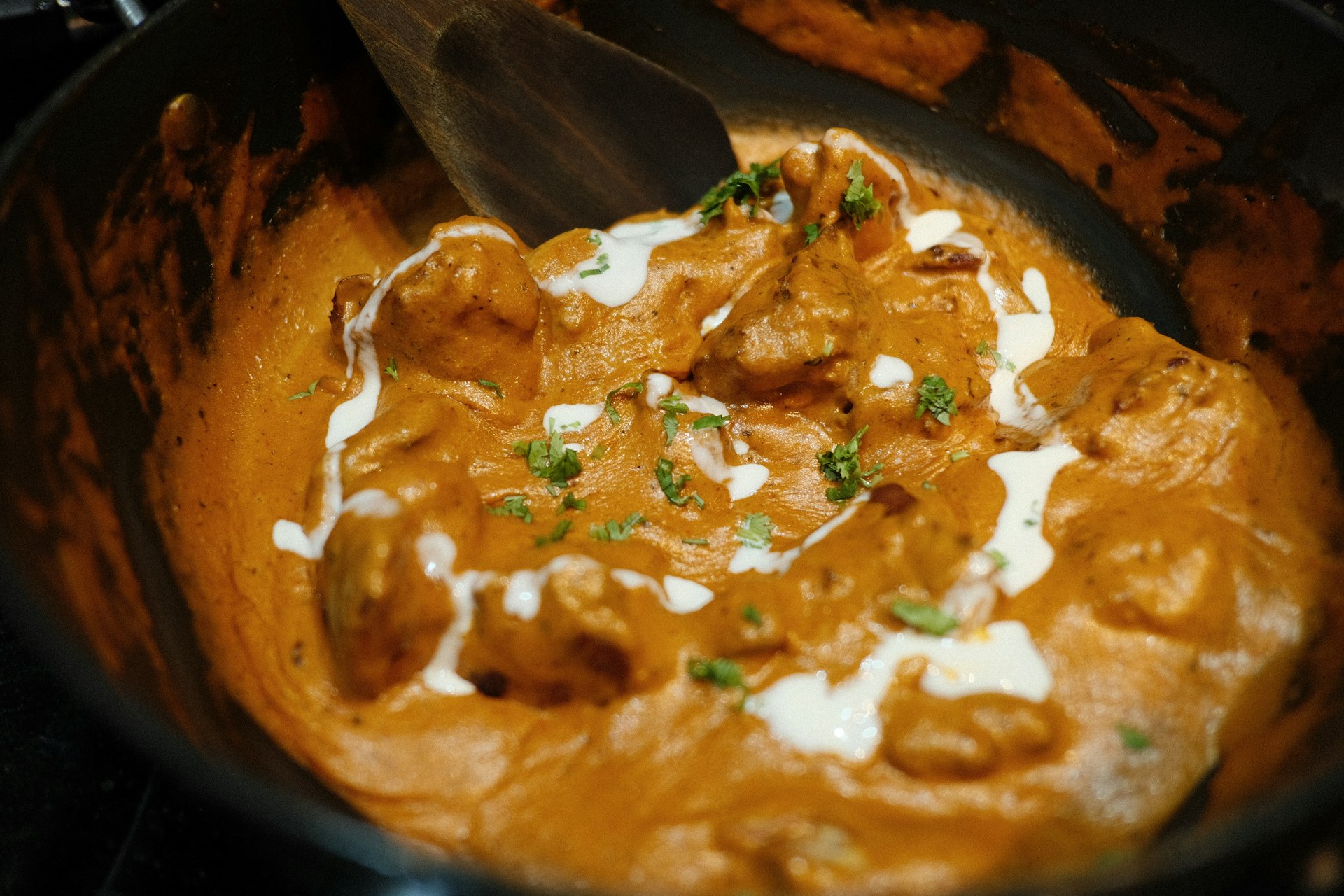 Curry finished in a brass bowl